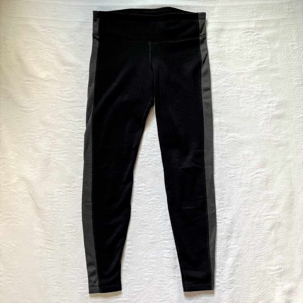 Athleta Fleece-lined running tights black with gray sides back zipper pocket